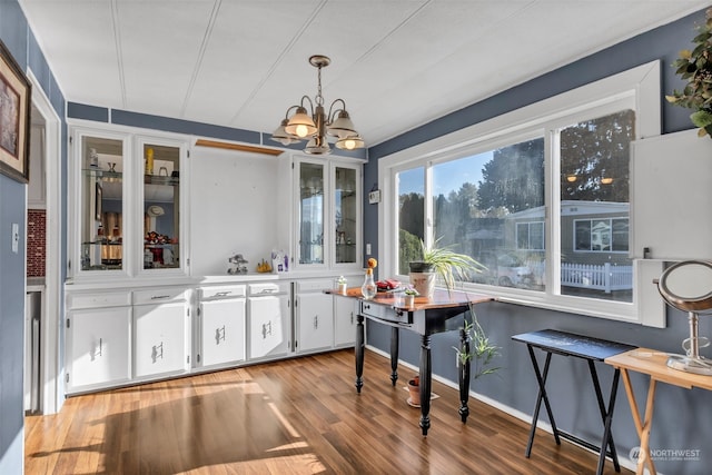 interior space featuring a notable chandelier and light hardwood / wood-style floors