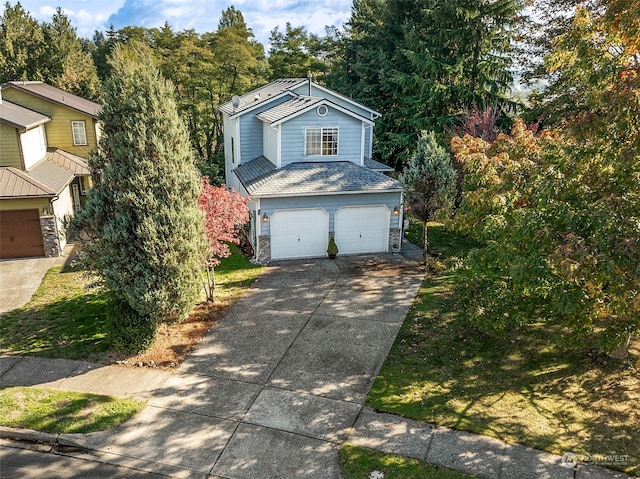 front facade with a garage