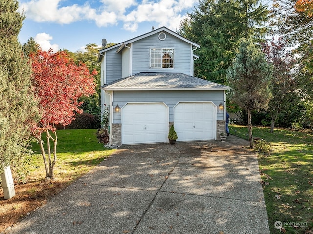 garage featuring a yard