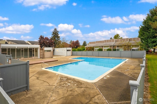 view of pool with a patio area