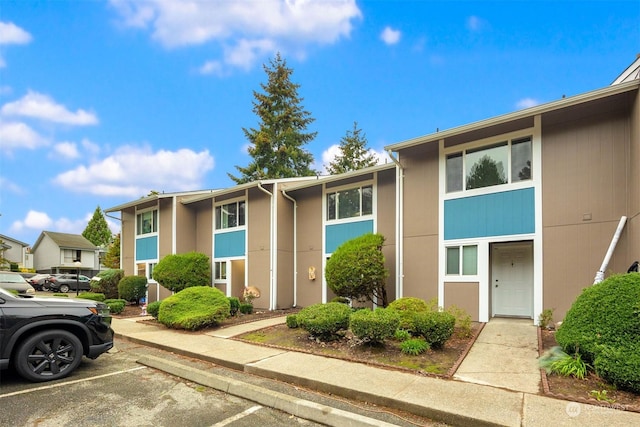 10648 SE 254th Pl Unit I3, Kent, WA 98030 - view of property featuring uncovered parking