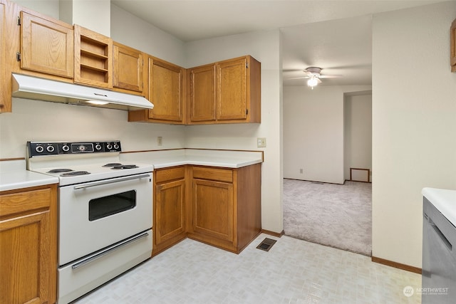 kitchen featuring ceiling fan, white electric range, and light carpet