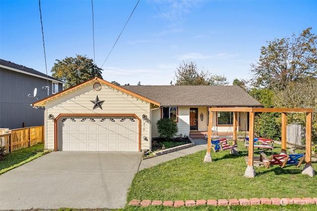 view of front of house featuring a front lawn and a garage