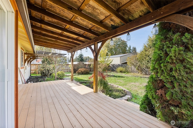 wooden terrace with a yard