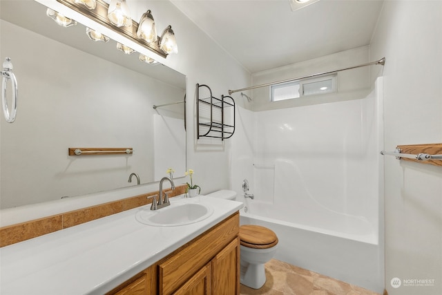 full bathroom with vanity, toilet, and shower / washtub combination