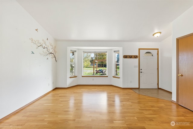 entryway with light wood-type flooring