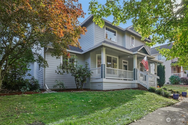 view of front of house featuring a porch and a front lawn