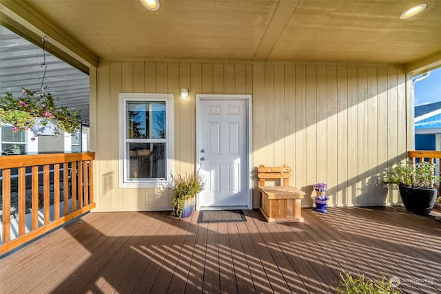 entrance to property featuring a deck