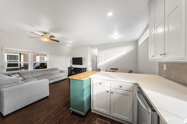 2101 S 324th St Unit 158, Federal Way, WA 98003 - kitchen featuring stainless steel dishwasher, a peninsula, a wealth of natural light, and decorative backsplash