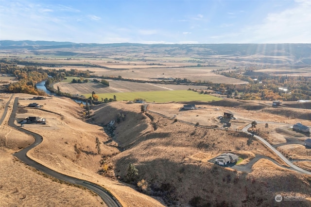 aerial view featuring a mountain view and a rural view