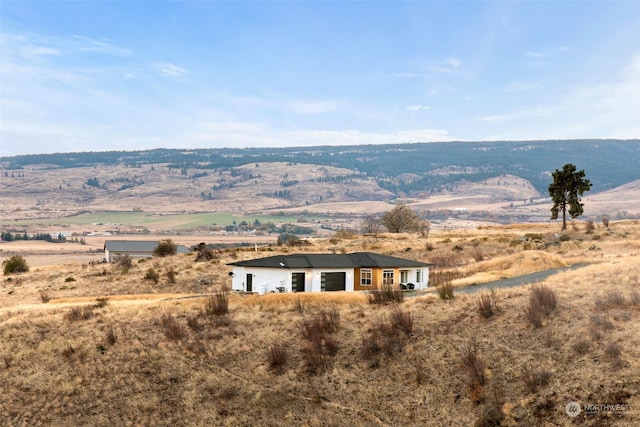 exterior space featuring a mountain view and a rural view