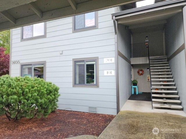 3600 Narrows View Ln Unit 201, Bremerton, WA 98310 - view of exterior entry featuring crawl space