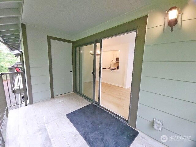 3600 Narrows View Ln Unit 201, Bremerton, WA 98310 - property entrance featuring a balcony and a sink
