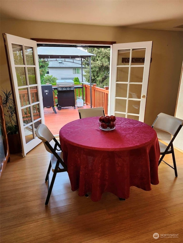 dining room featuring hardwood / wood-style flooring