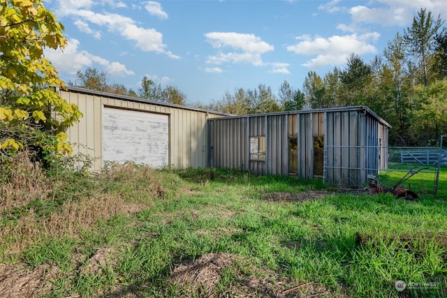 view of outdoor structure with a garage