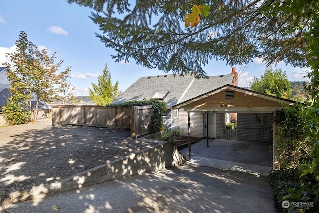 view of front facade with a carport