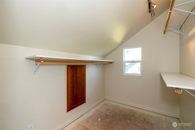 spacious closet featuring vaulted ceiling