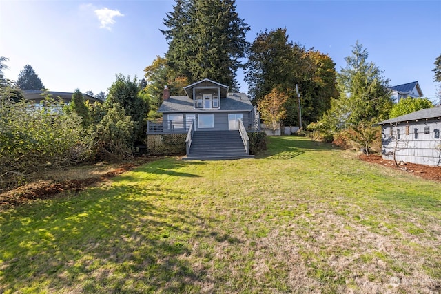 view of yard featuring a deck