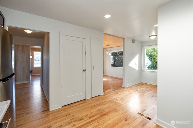 hallway featuring light hardwood / wood-style flooring