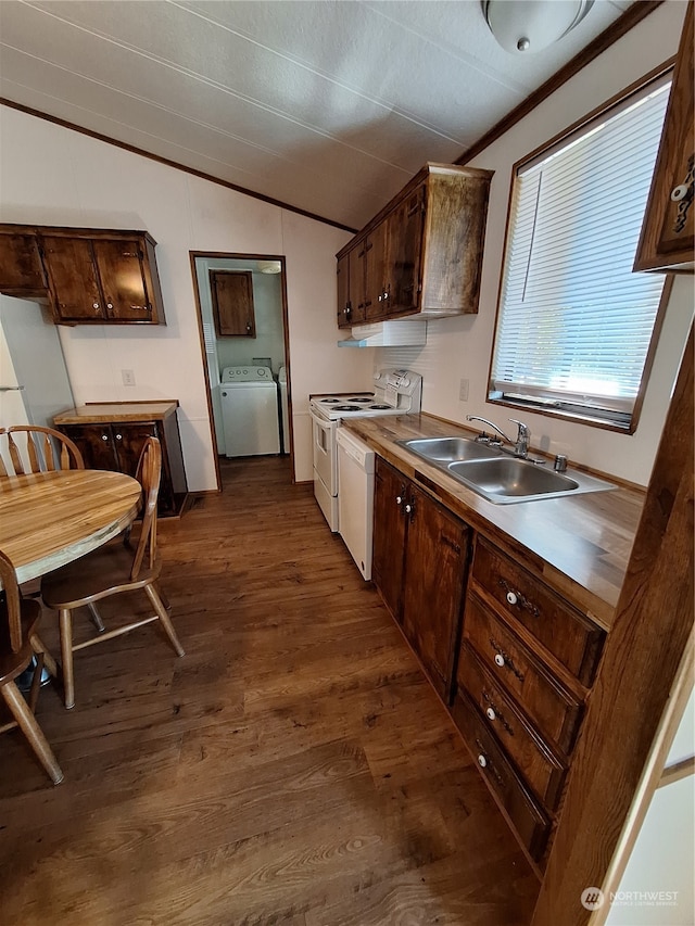 kitchen with lofted ceiling, dark hardwood / wood-style floors, washer / dryer, sink, and dark brown cabinetry