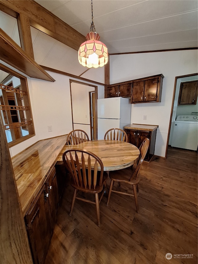 dining area with crown molding, washer / clothes dryer, vaulted ceiling with beams, and dark hardwood / wood-style floors