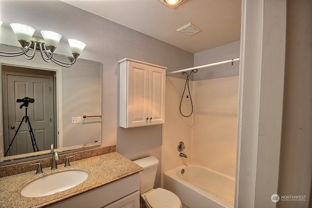 full bathroom featuring vanity, shower / washtub combination, a textured ceiling, and toilet