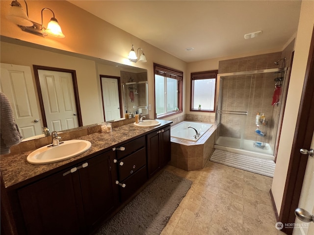 bathroom with vanity and plus walk in shower