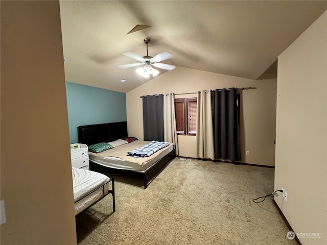 carpeted bedroom featuring lofted ceiling and ceiling fan