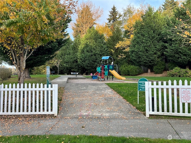 view of playground with a yard