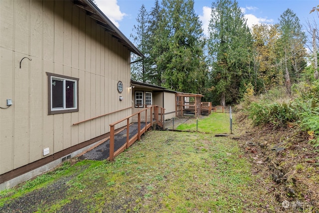 view of yard with a wooden deck