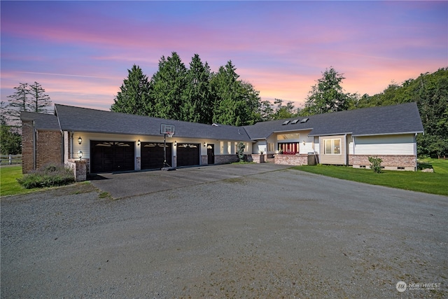 single story home featuring a garage