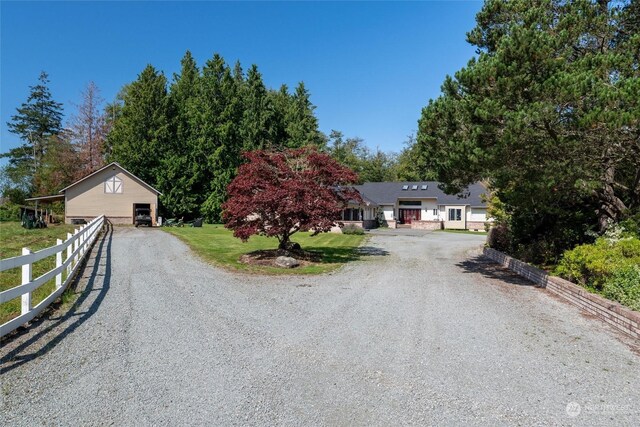 13629 Rector Rd, Bow, WA 98232 - view of front of property with gravel driveway and an outbuilding