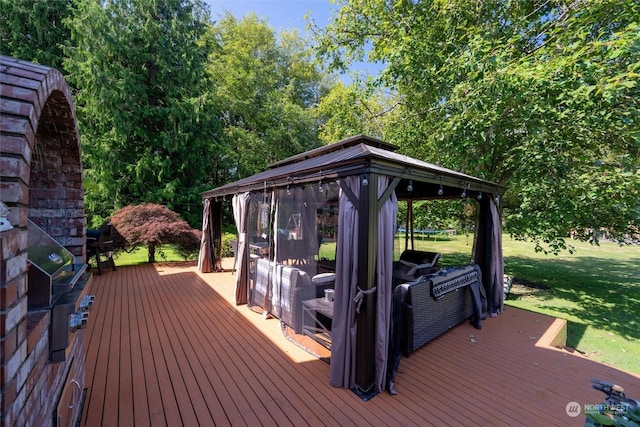13629 Rector Rd, Bow, WA 98232 - wooden deck with a trampoline, a gazebo, and a yard