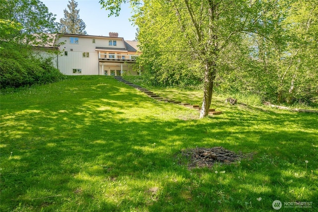 view of yard with a wooden deck
