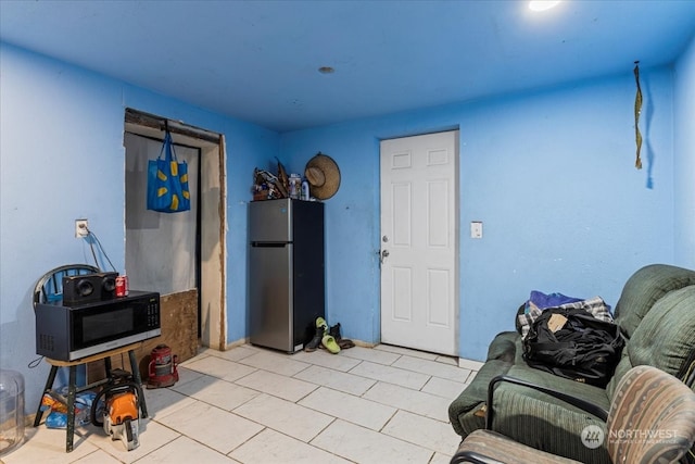 living room featuring light tile patterned floors