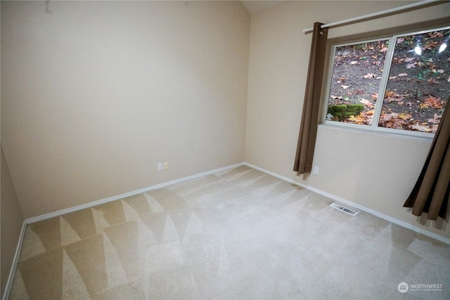 view of carpeted spare room