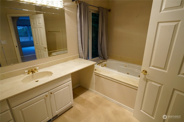 bathroom with vanity and a tub to relax in