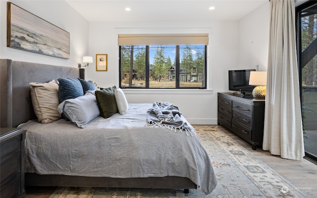 bedroom featuring light hardwood / wood-style floors