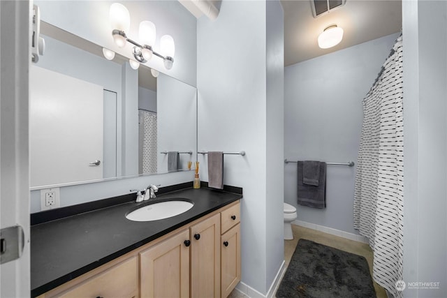 744 Market St Unit 302, Tacoma, WA 98402 - full bathroom featuring toilet, baseboards, vanity, and visible vents