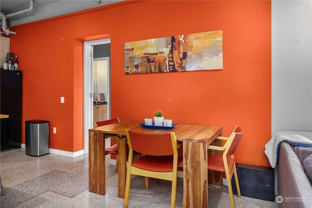 744 Market St Unit 302, Tacoma, WA 98402 - dining space featuring baseboards and rail lighting