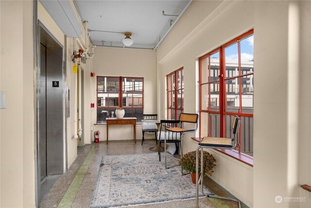 744 Market St Unit 302, Tacoma, WA 98402 - hallway with elevator and speckled floor