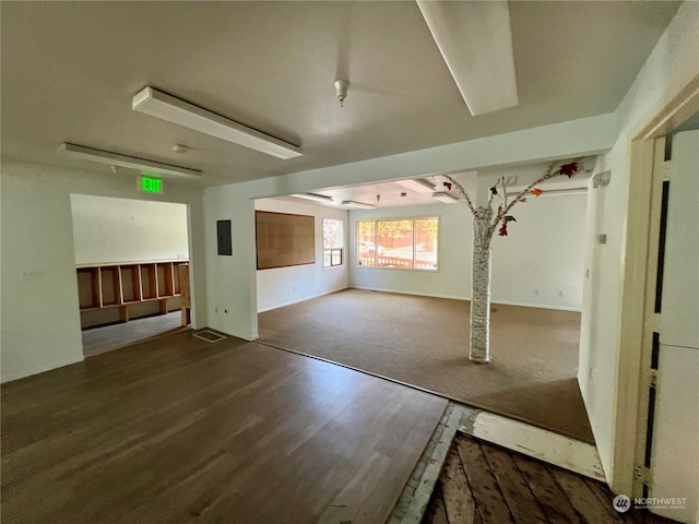 spare room with wood-type flooring