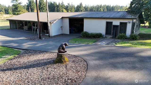 single story home with a garage