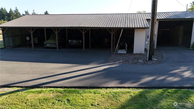 exterior space with a carport