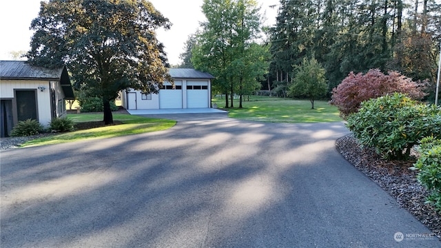 view of yard featuring a garage