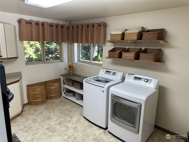 laundry room featuring independent washer and dryer