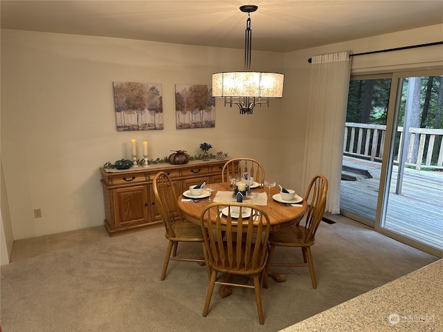 dining area with carpet flooring