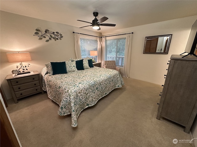 bedroom with light carpet and ceiling fan