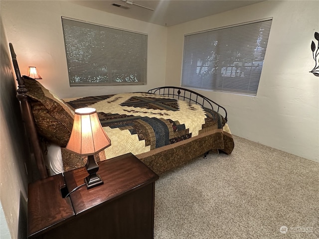 bedroom featuring carpet flooring