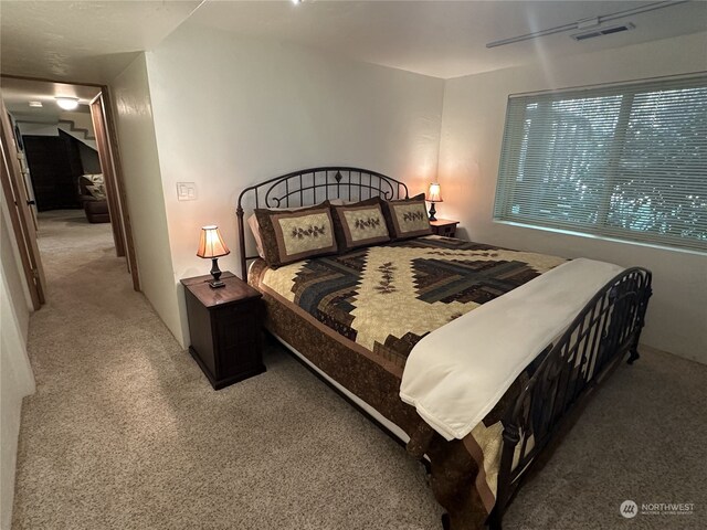 bedroom featuring carpet